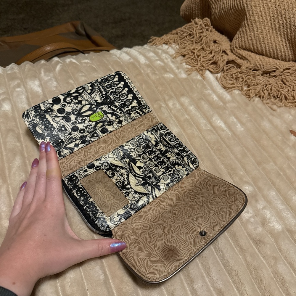 Sakroots Black and Tan Wallet with Elegant Design